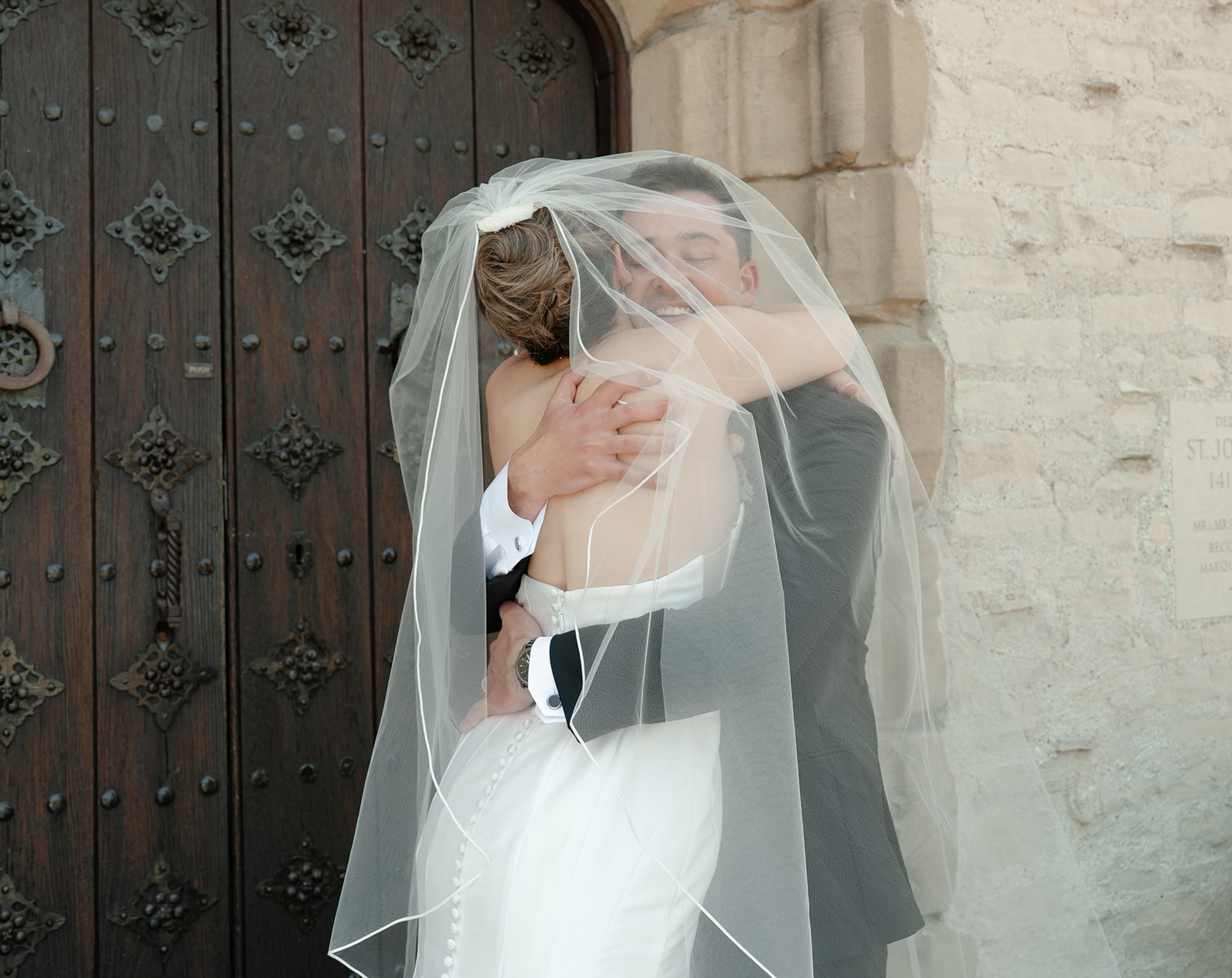Groom’s emotional reaction during the first look, as John sees Natalie in her Miss Ruby Boutique gown for the first time.